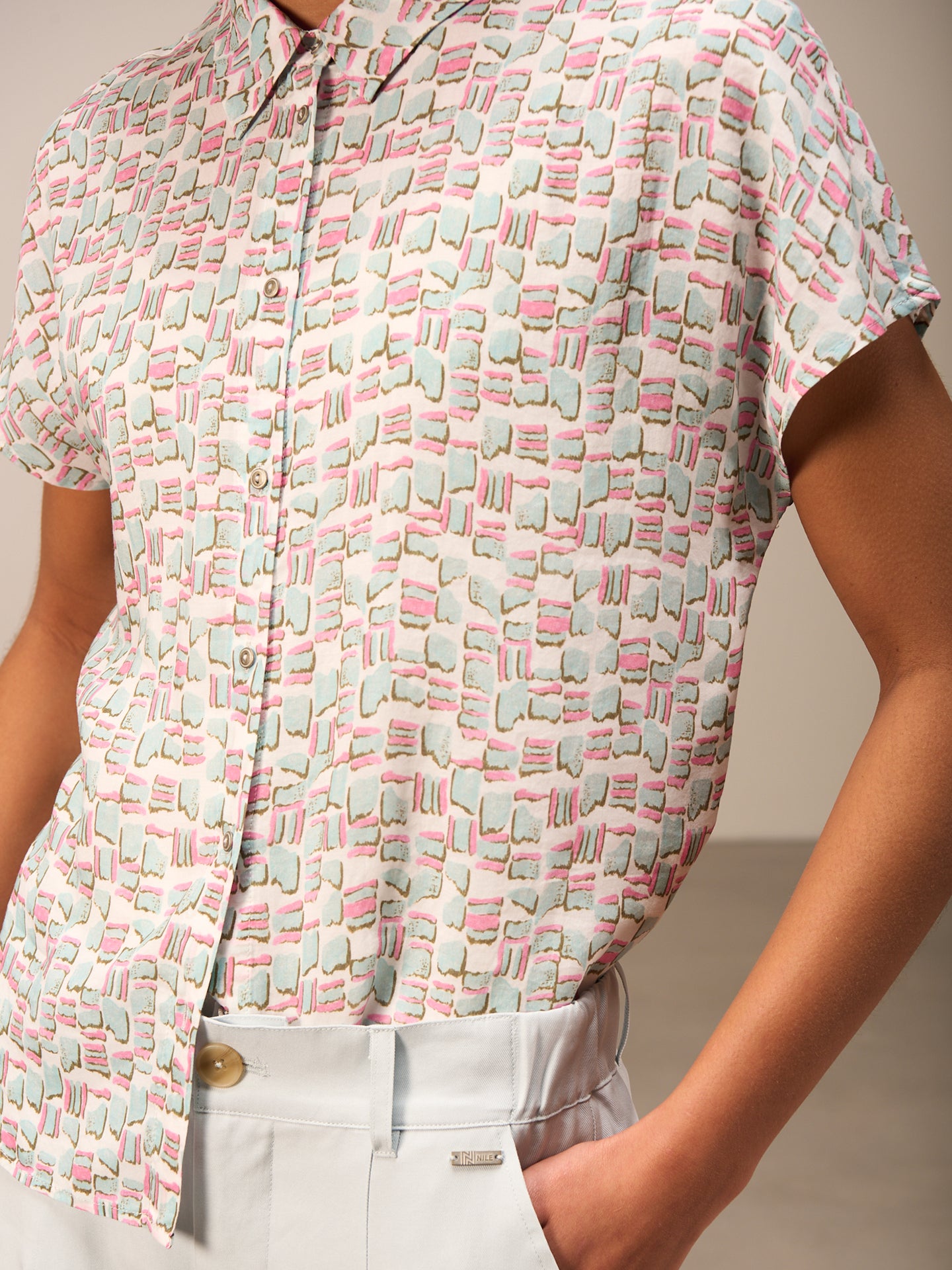 Blouse with button placket