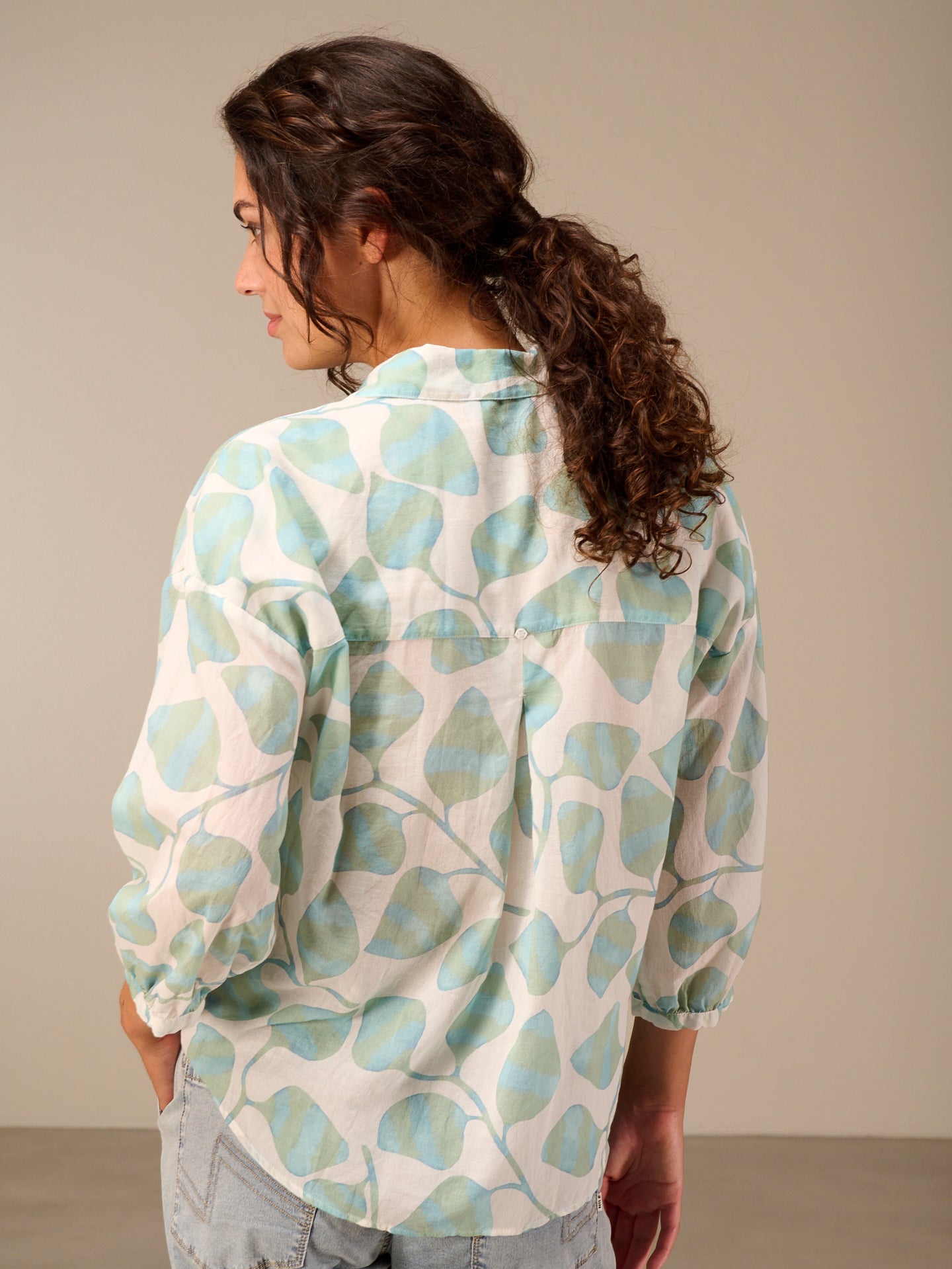 Blouse with button placket
