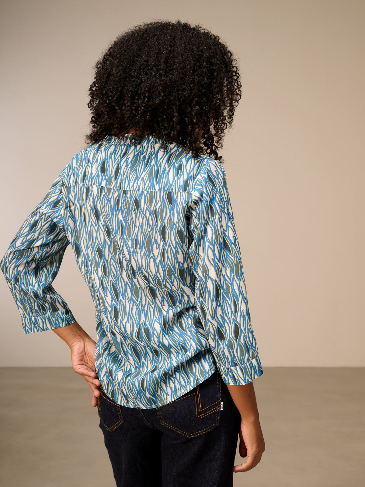 Blouse with stand-up collar