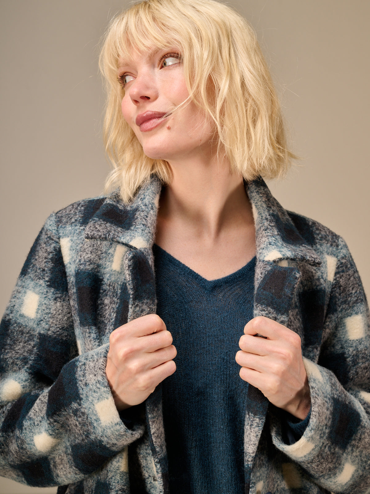Coat with check pattern