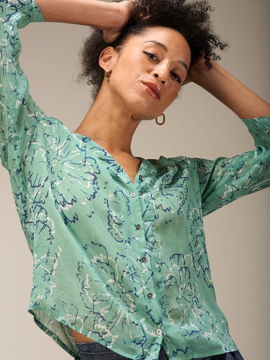 Blouse with button placket