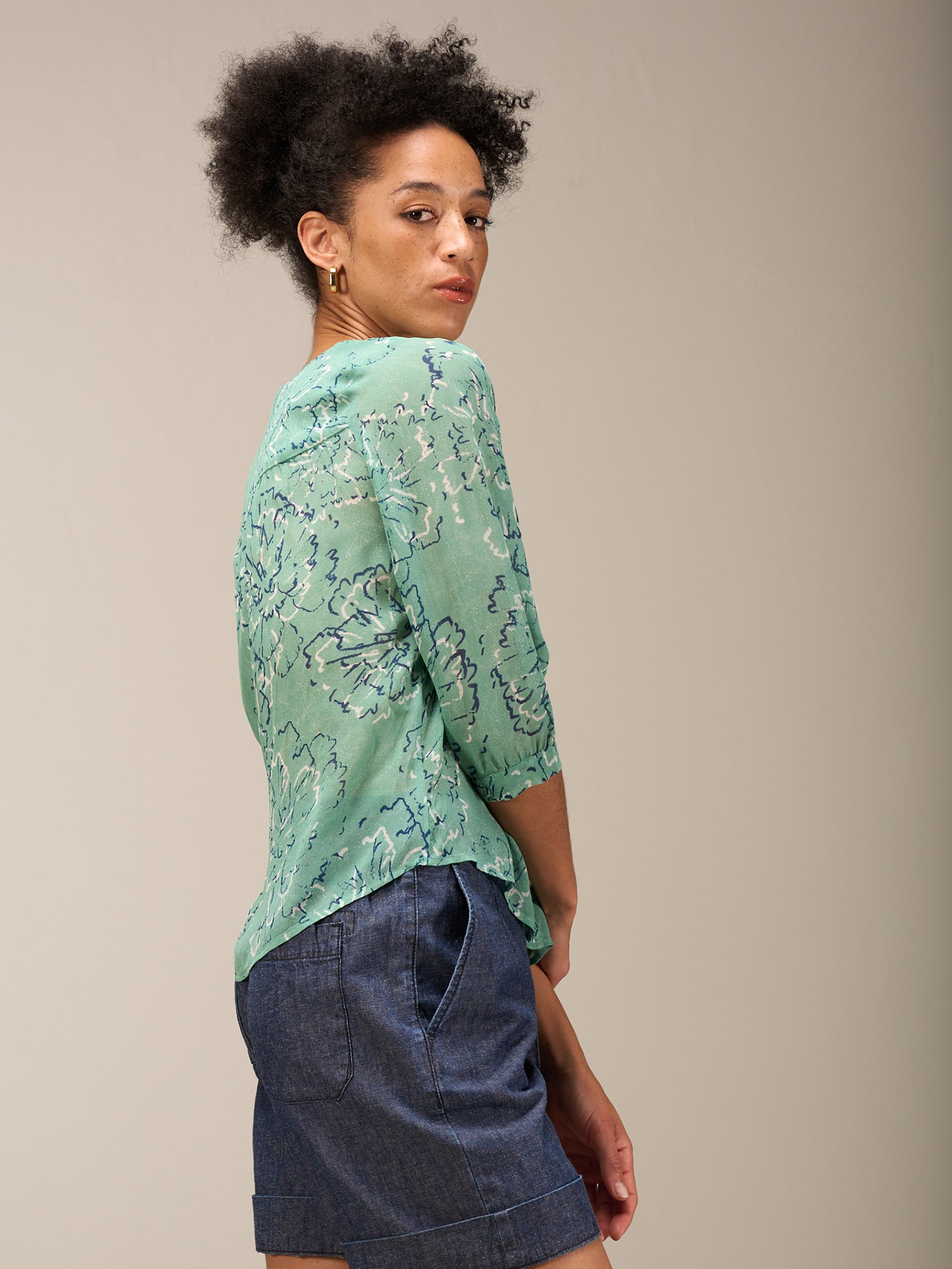 Blouse with button placket