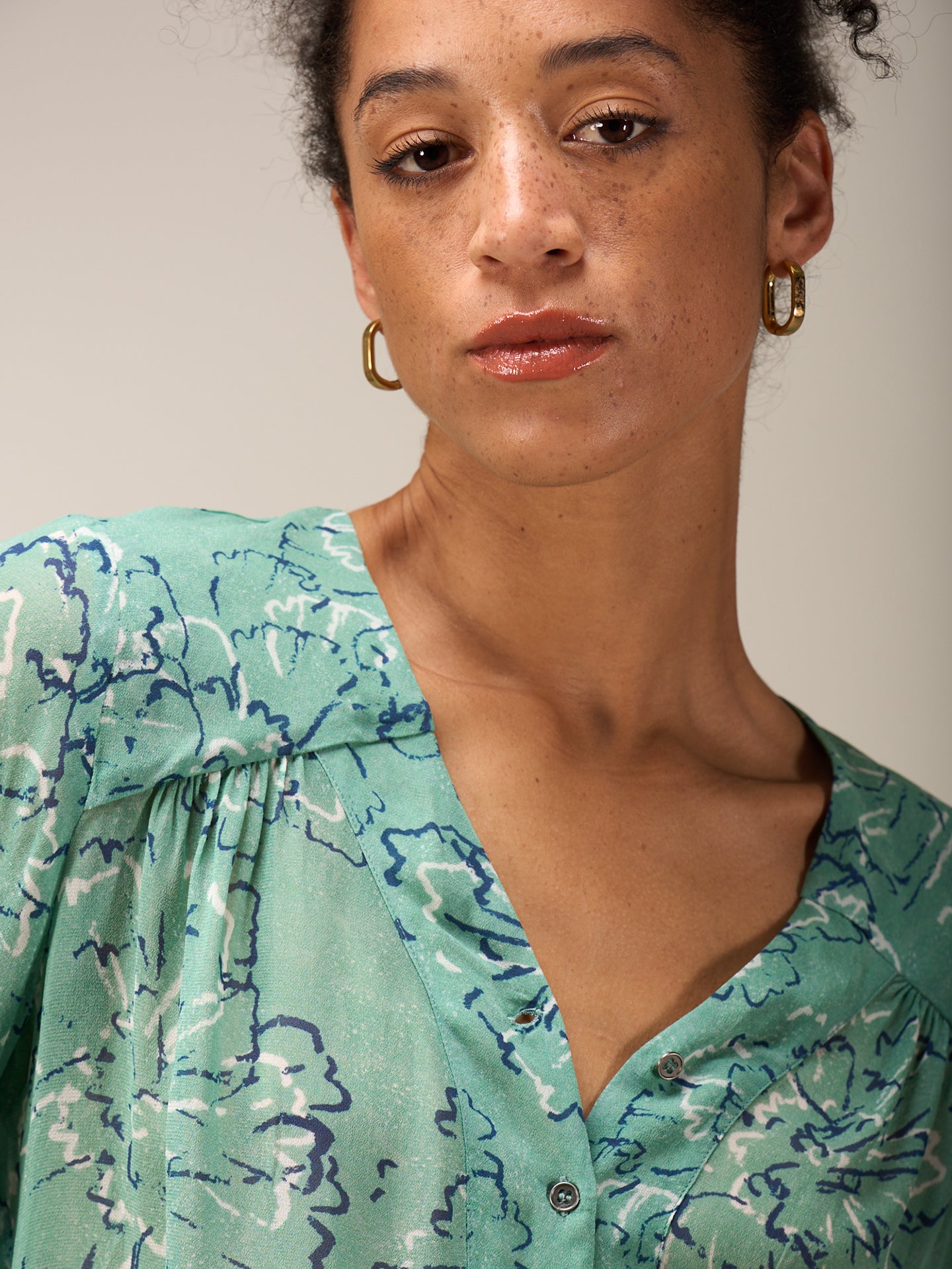Blouse with button placket