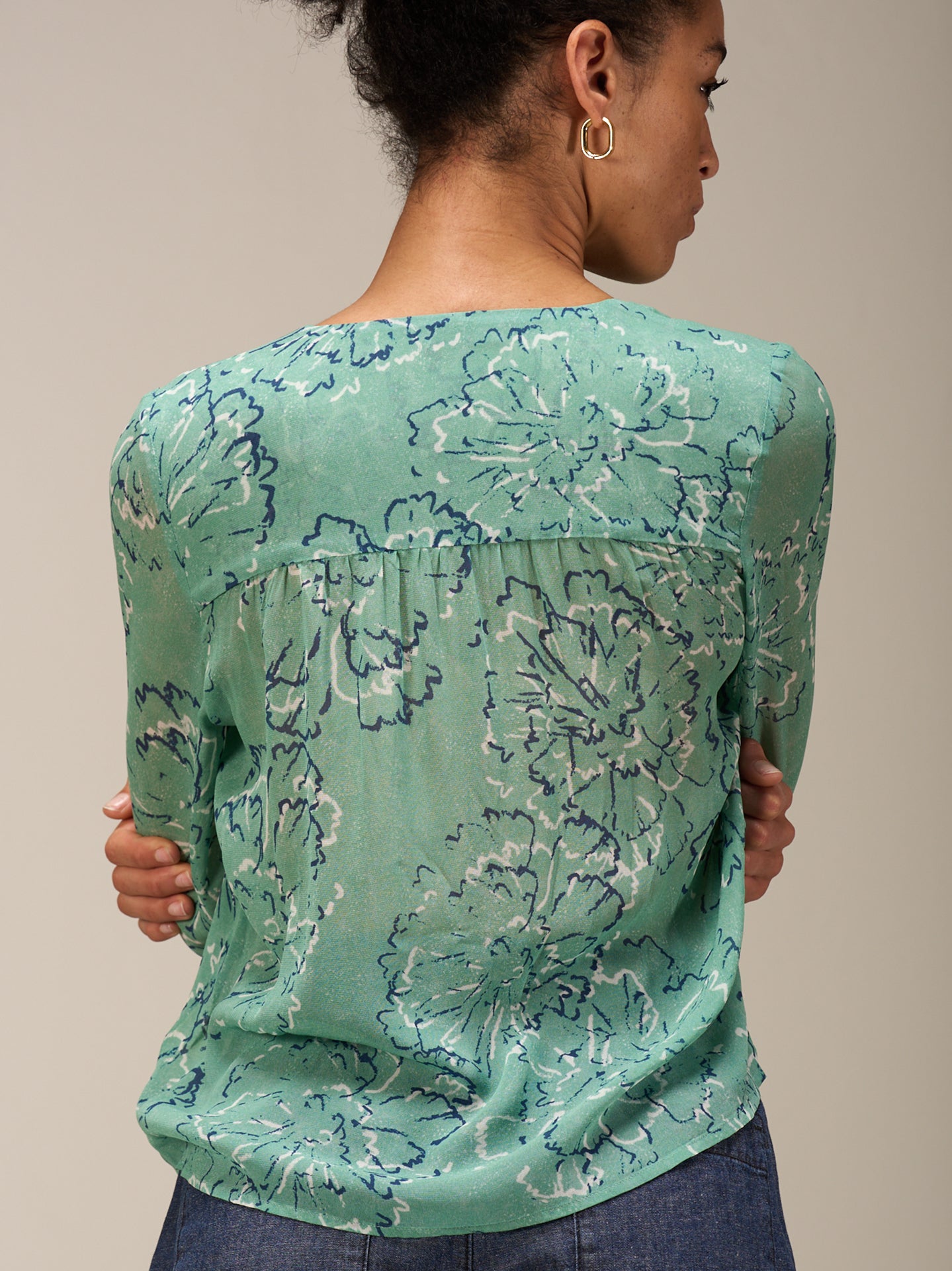 Blouse with button placket