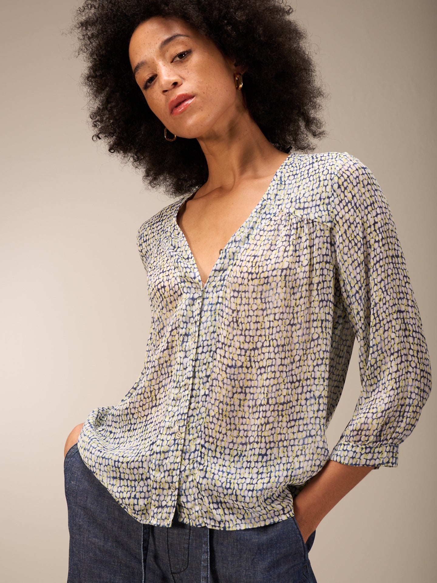 Blouse with button placket