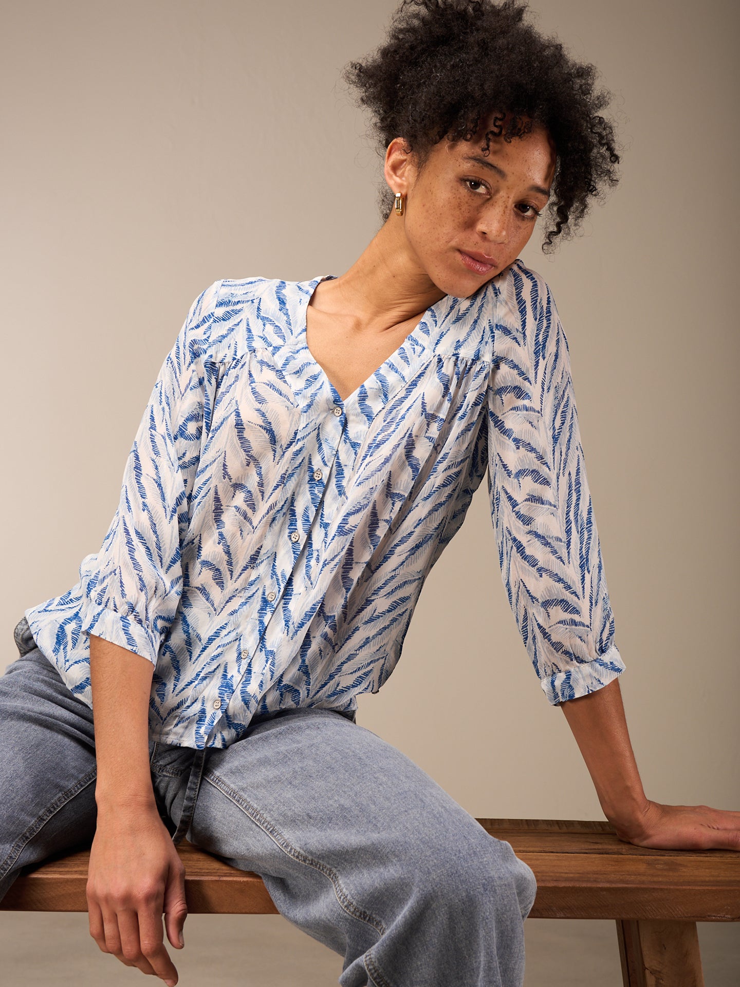 Blouse with button placket