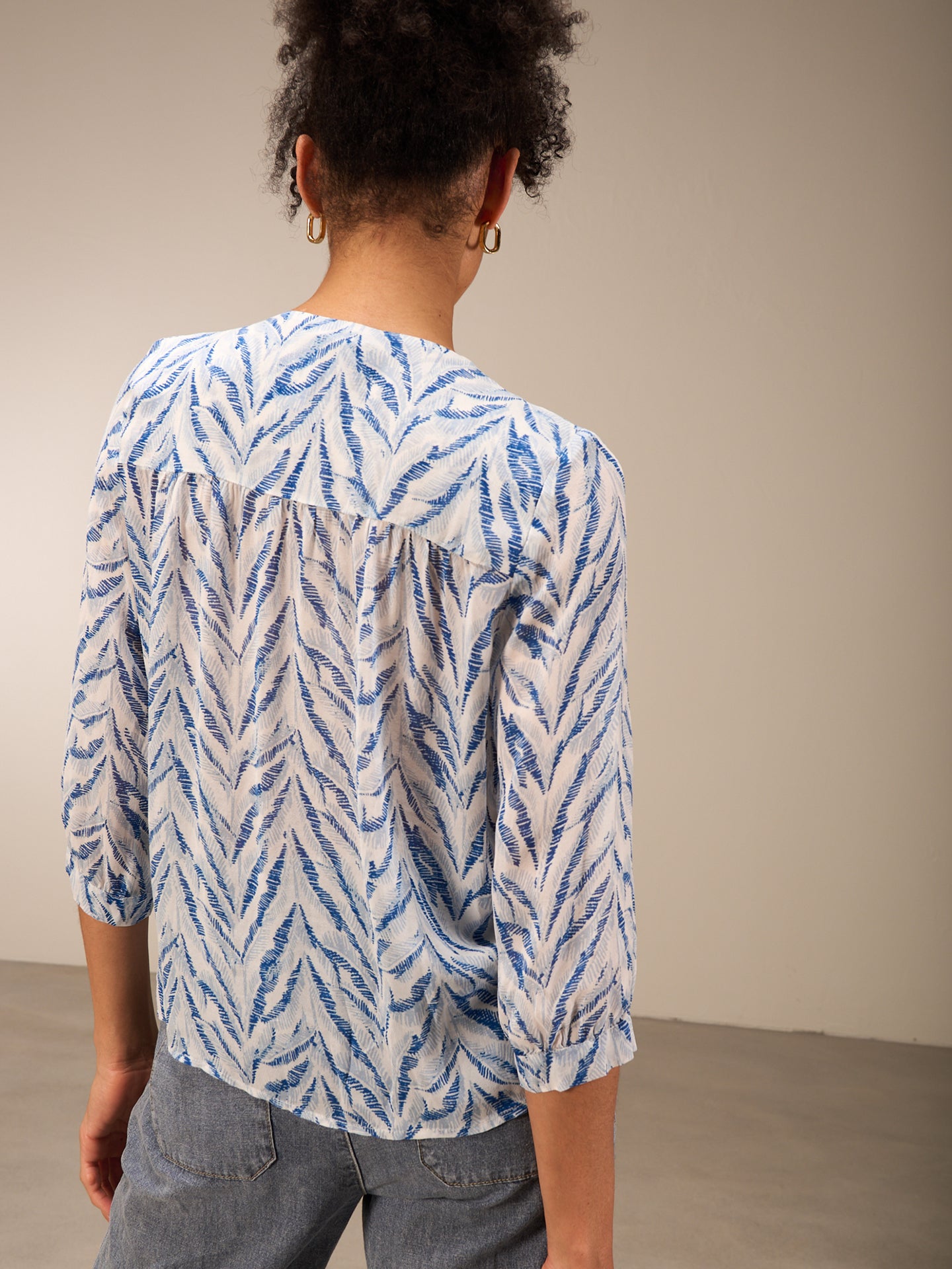 Blouse with button placket