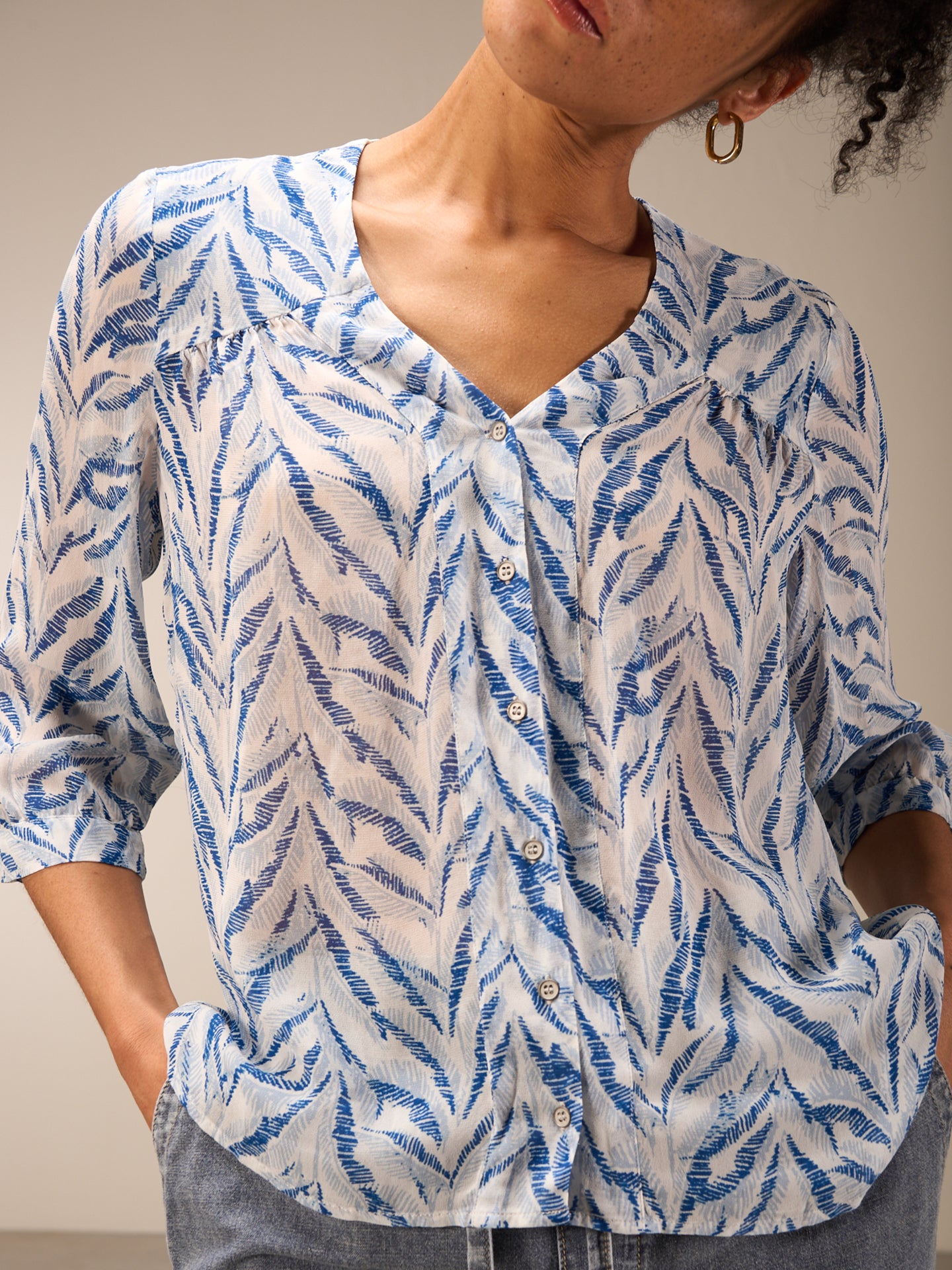 Blouse with button placket