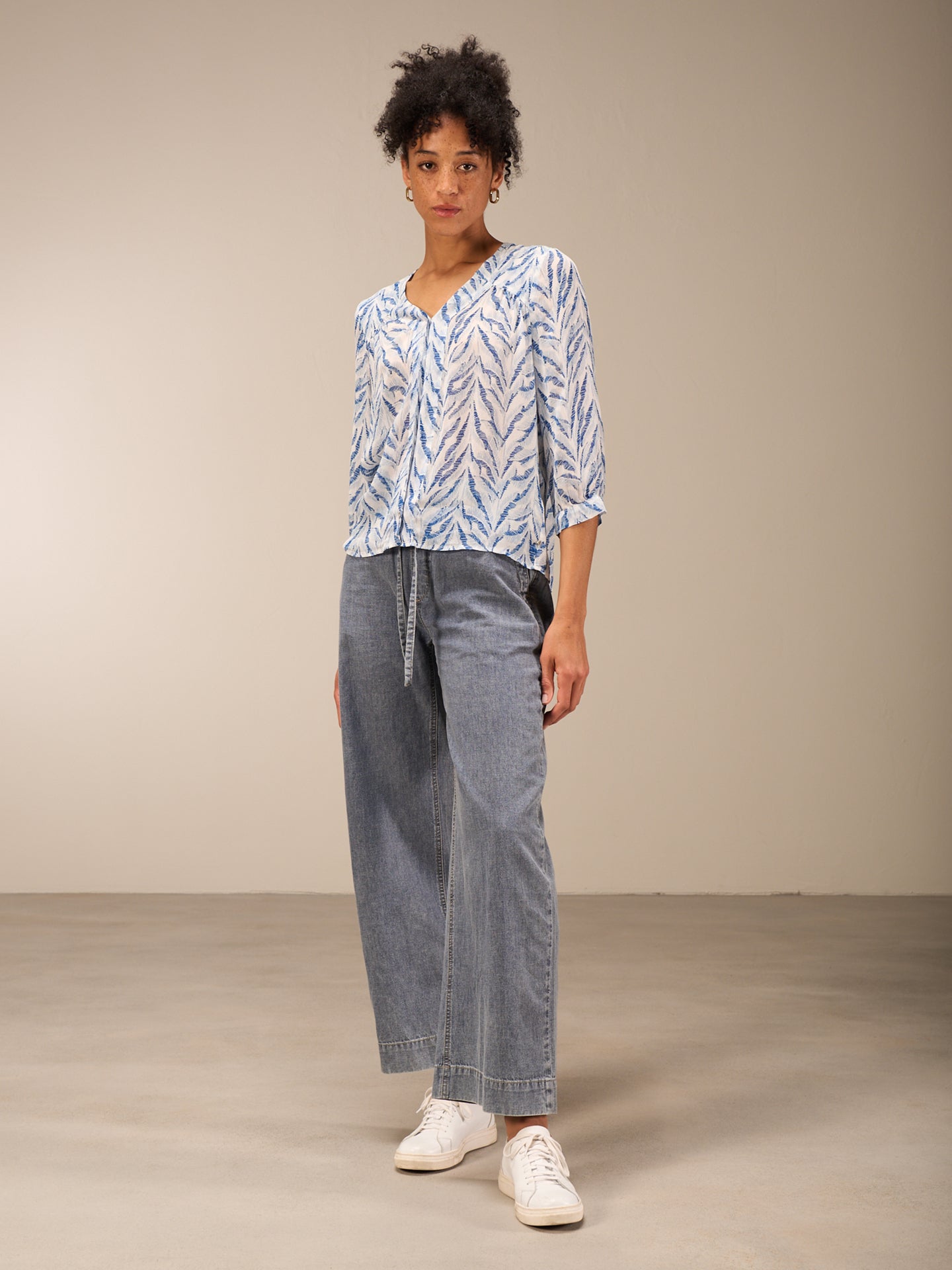 Blouse with button placket