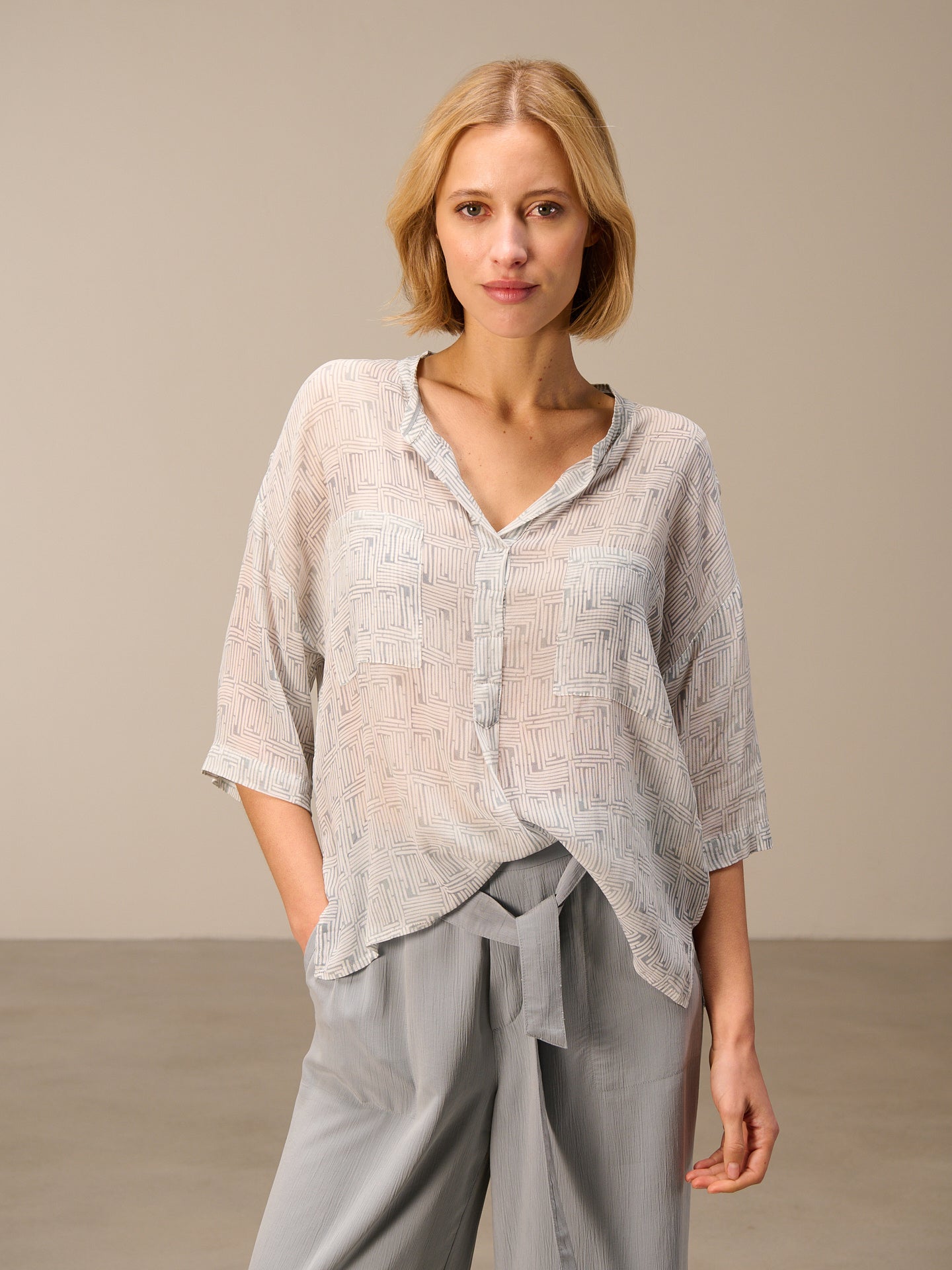 Blouse with stand-up collar