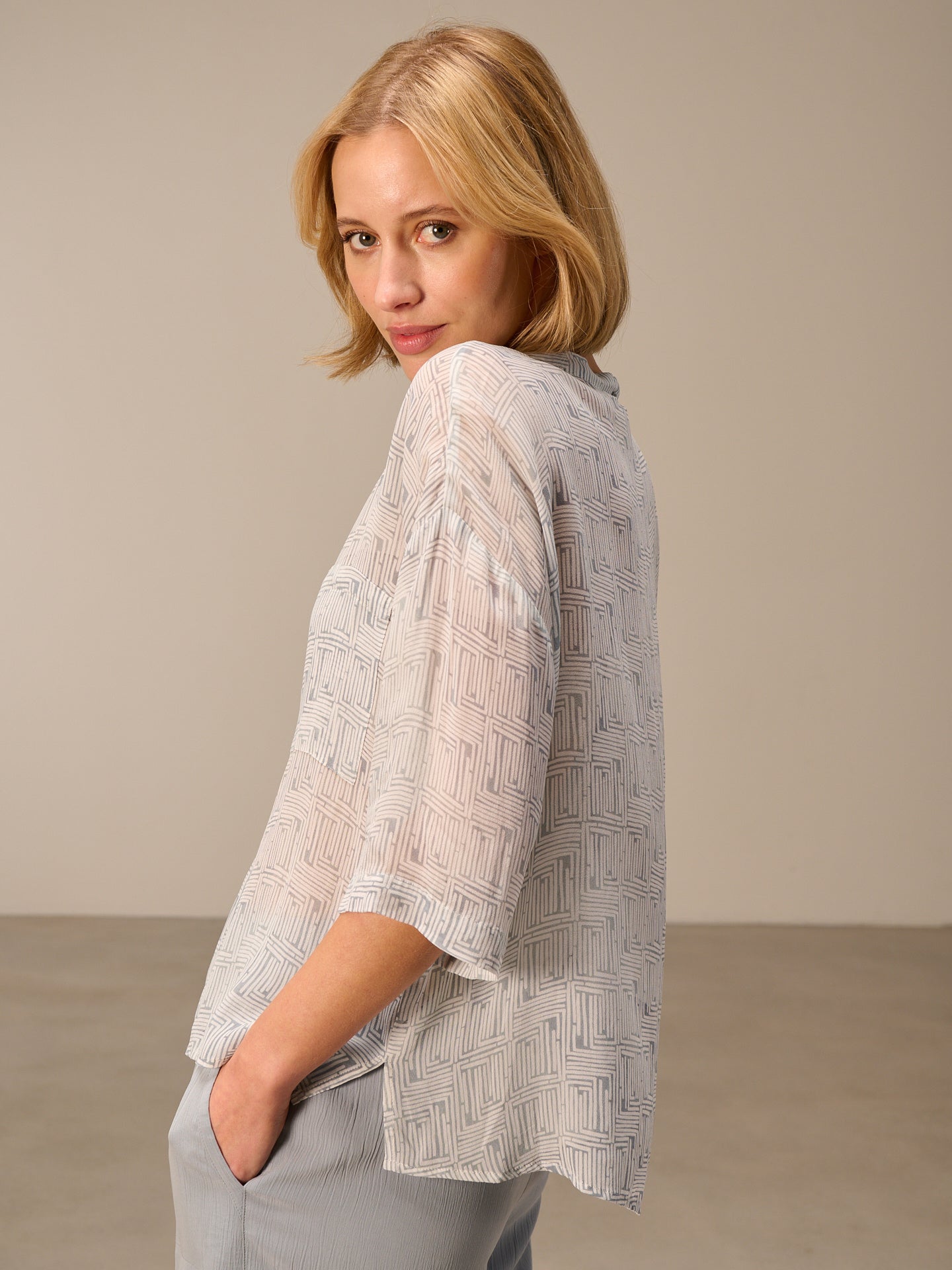 Blouse with stand-up collar
