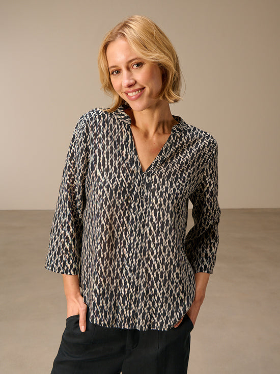 Blouse with stand-up collar