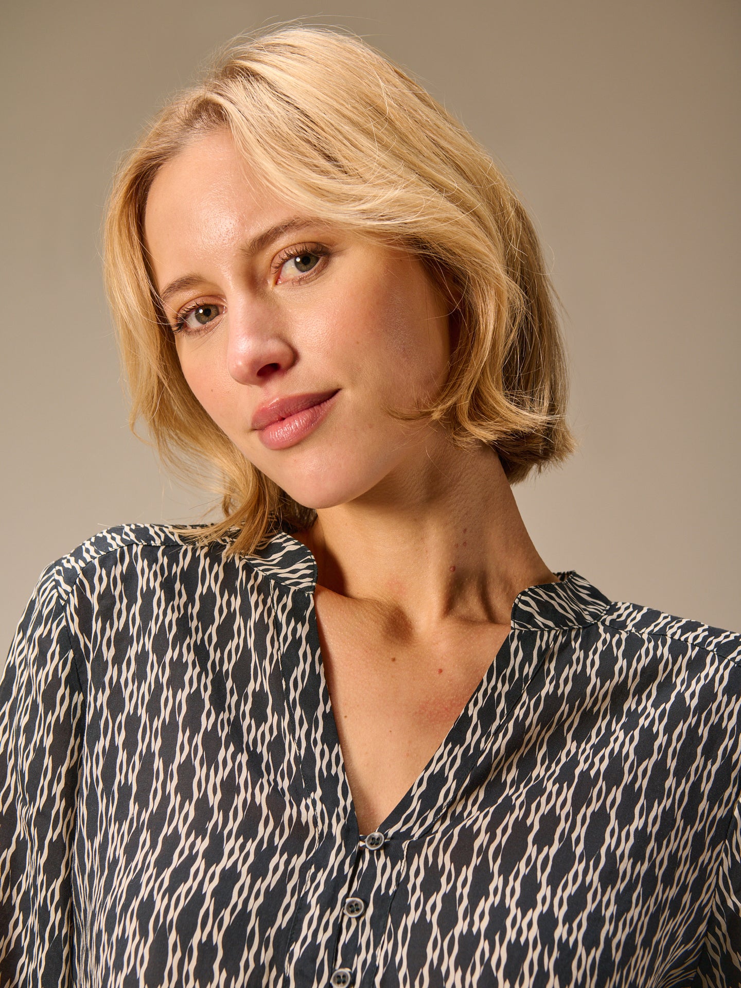 Blouse with stand-up collar