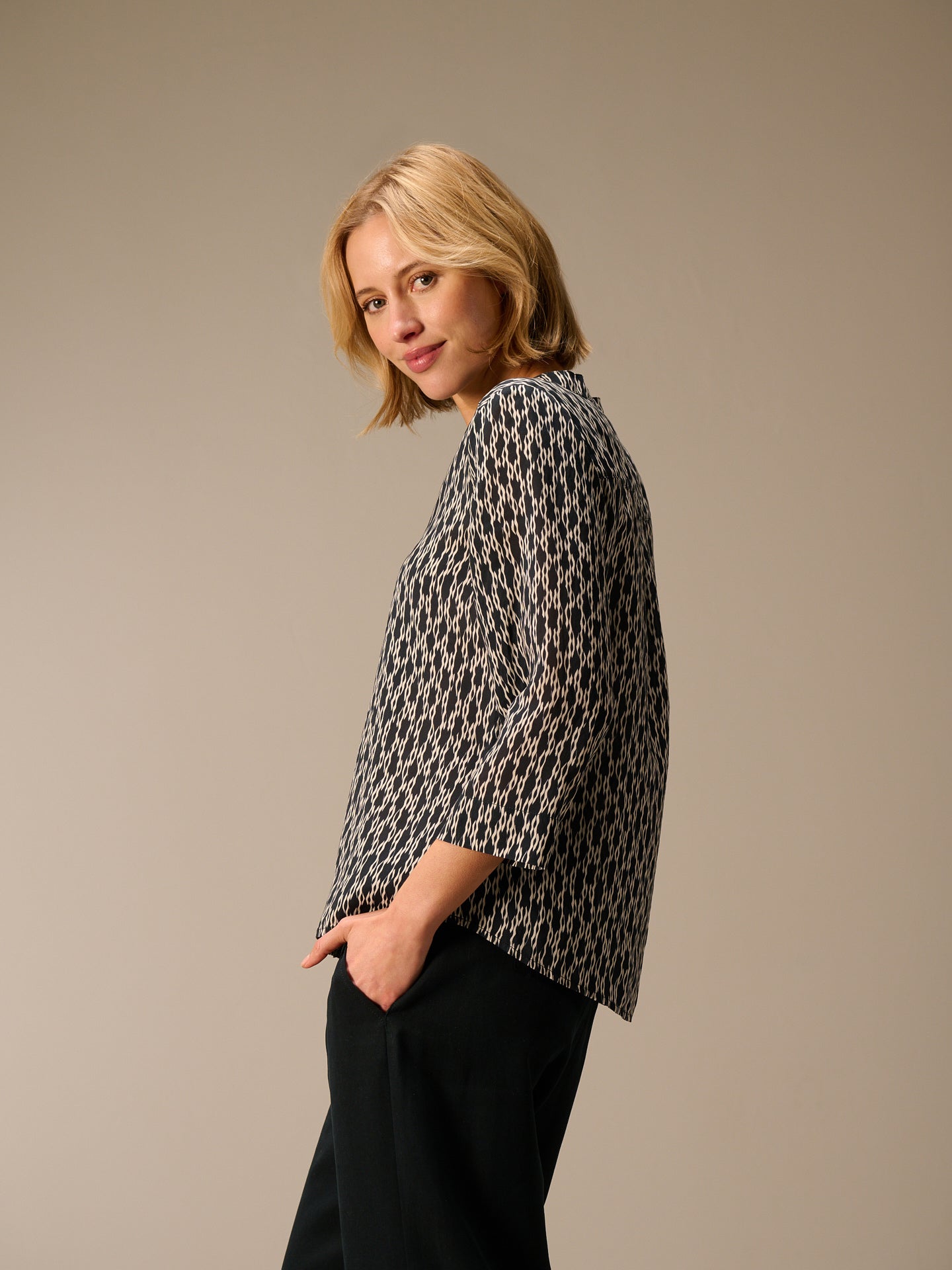 Blouse with stand-up collar