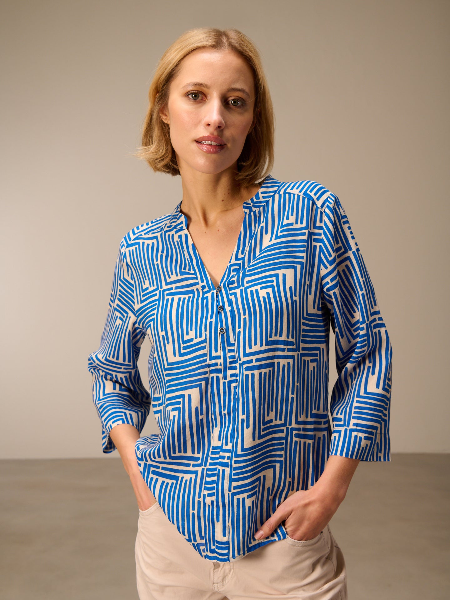 Blouse with stand-up collar