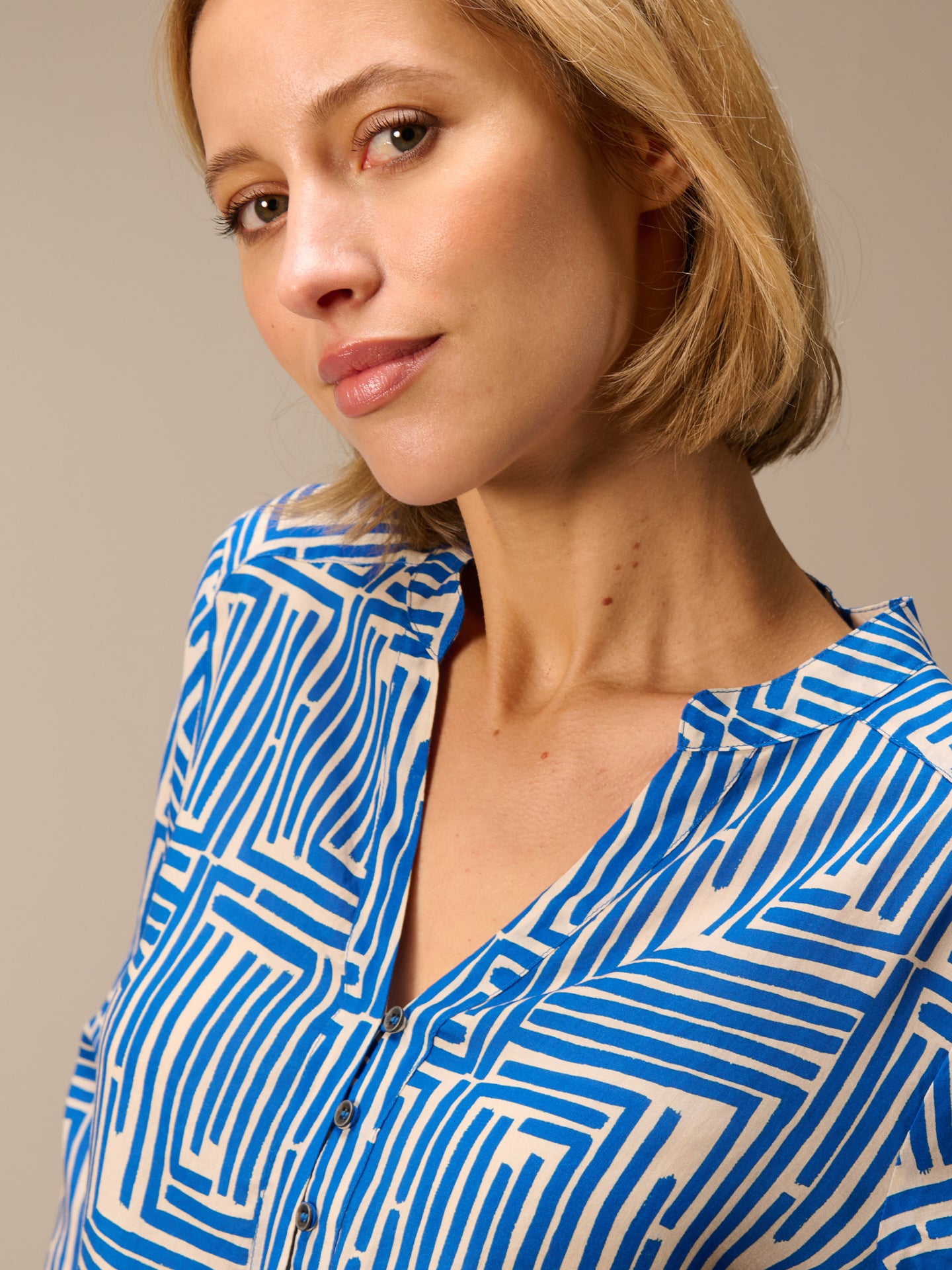 Blouse with stand-up collar