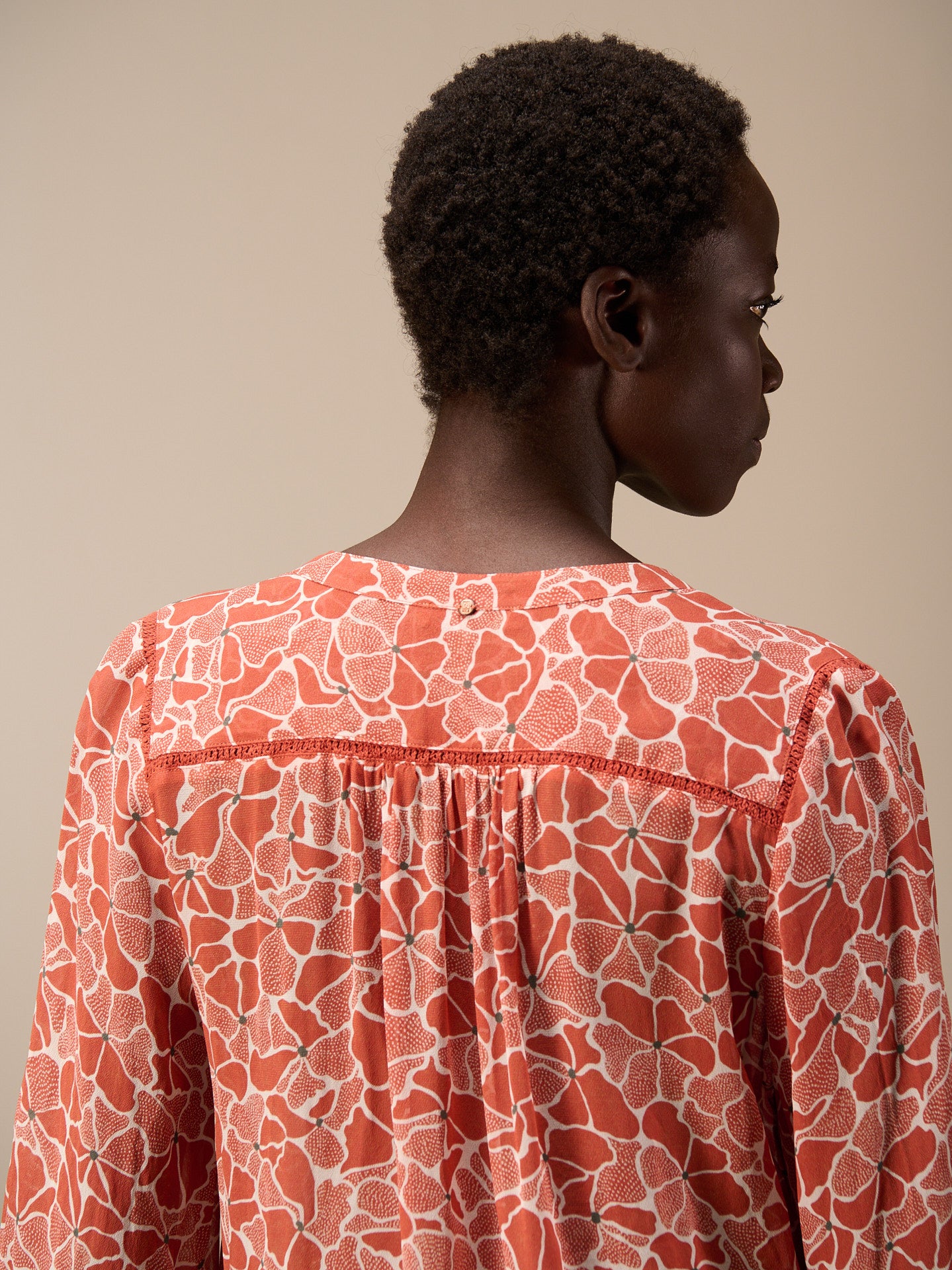 Blouse with button placket