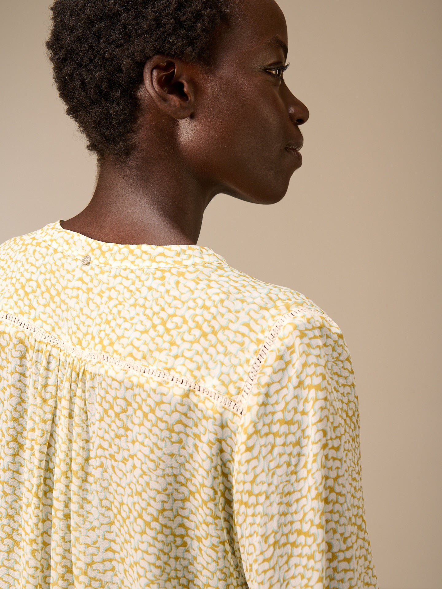 Blouse with button placket