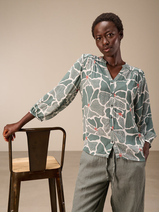 Blouse with button placket