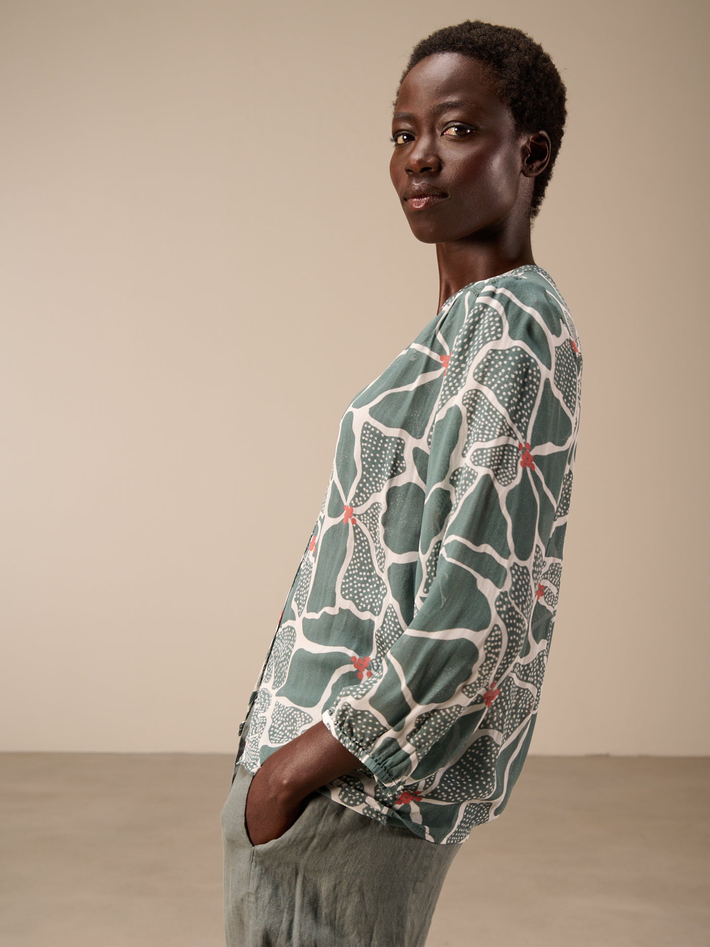 Blouse with button placket