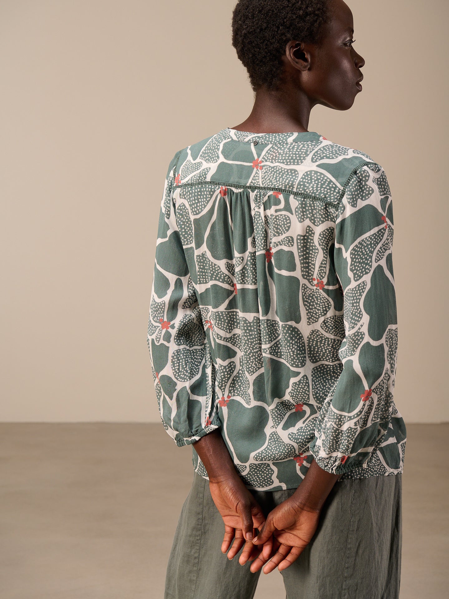 Blouse with button placket