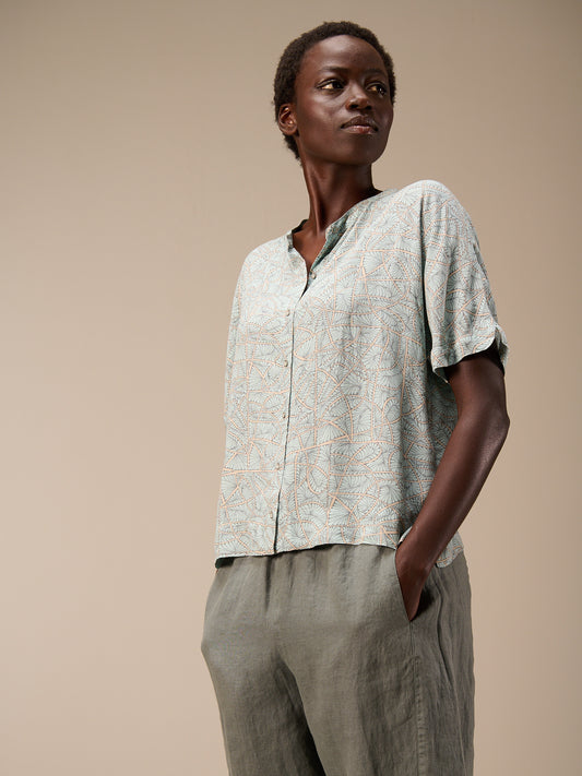 Blouse with stand-up collar