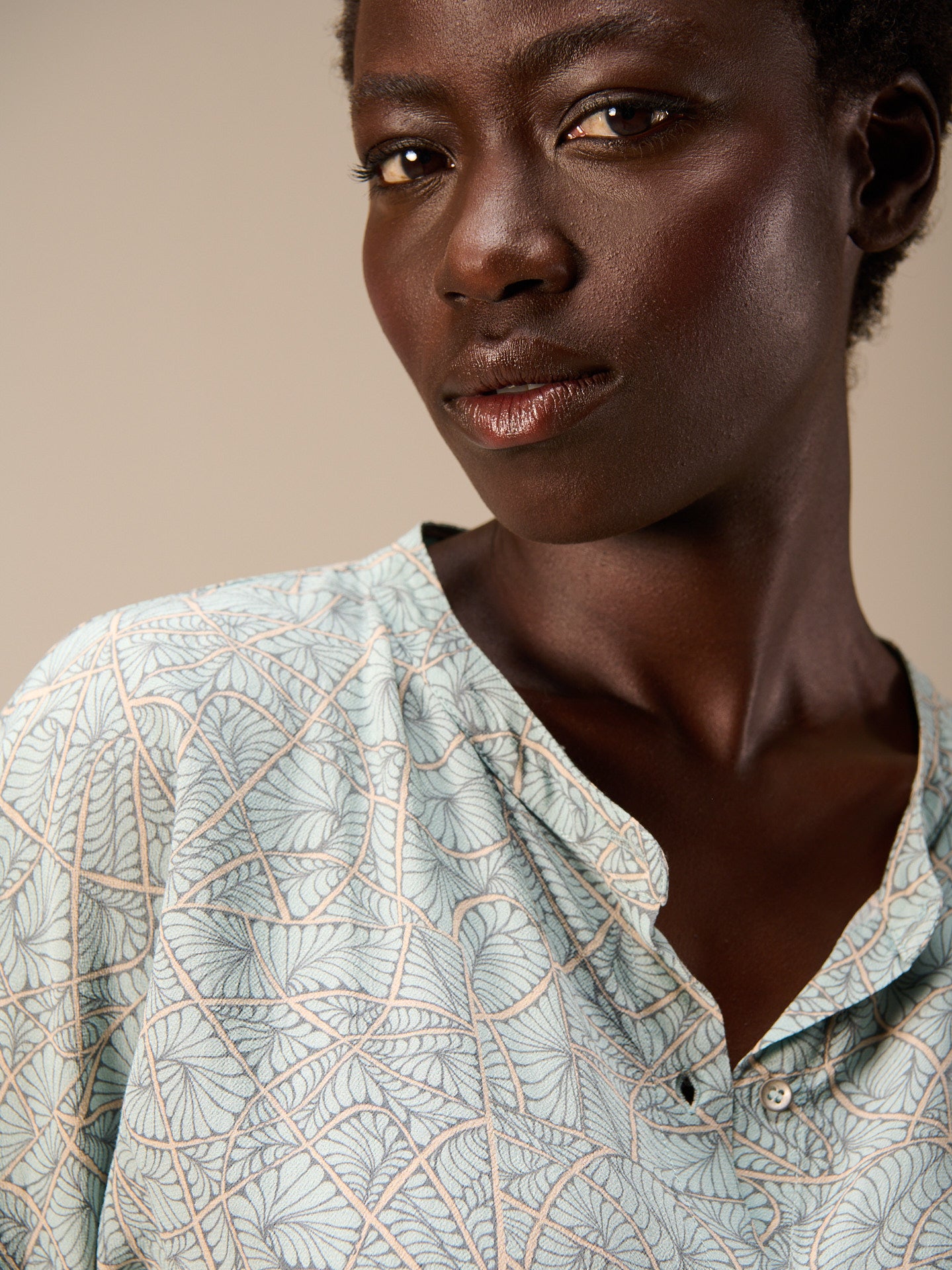 Blouse with stand-up collar
