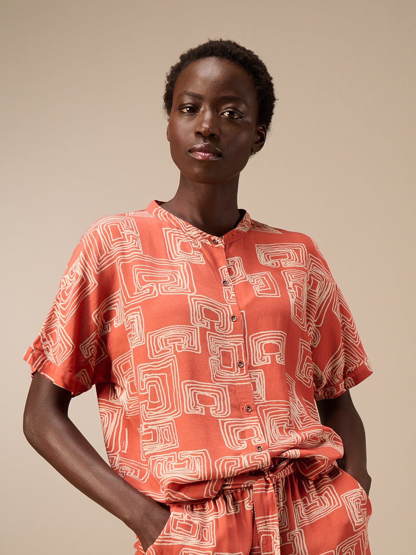 Blouse with stand-up collar