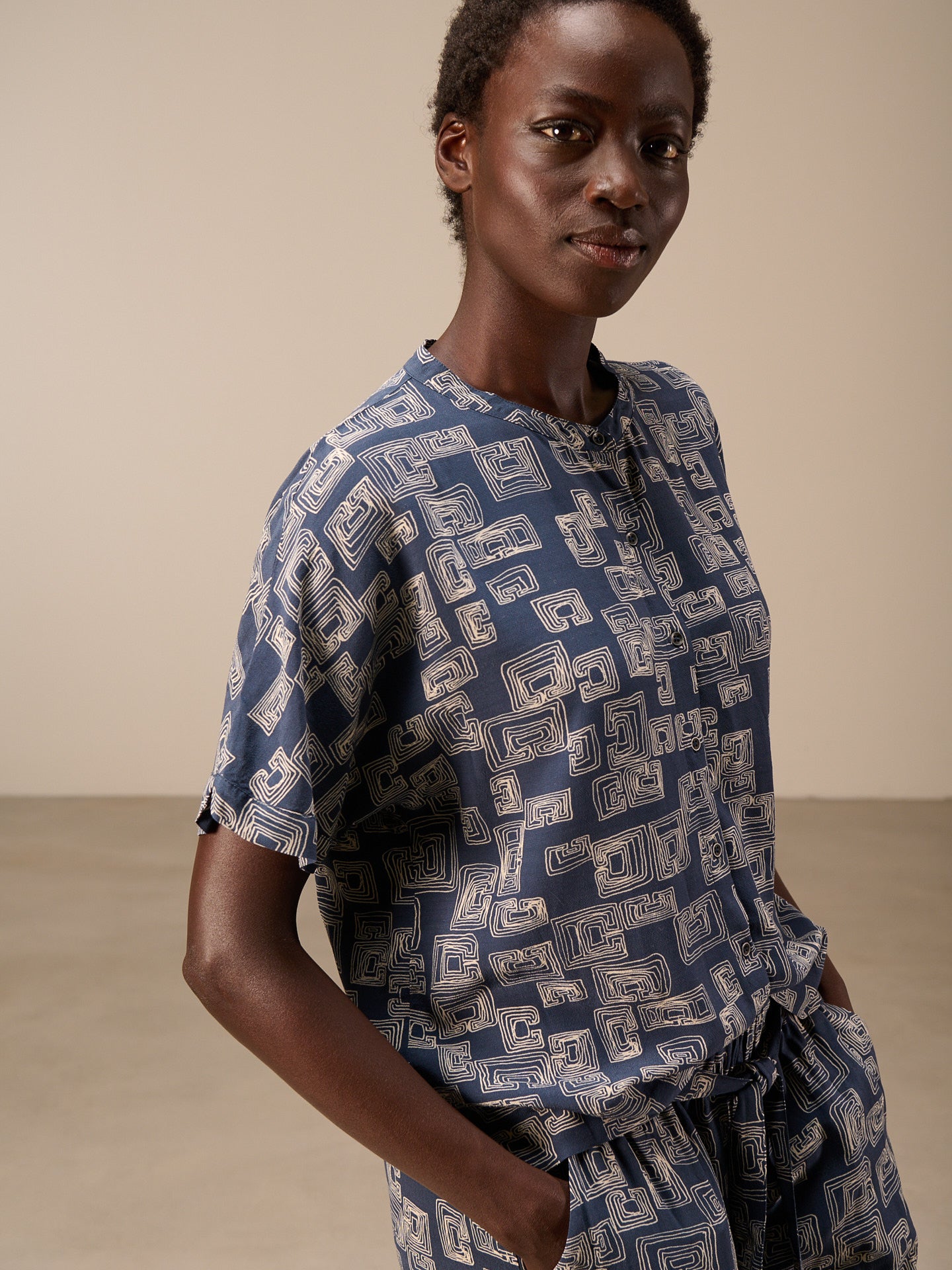 Blouse with stand-up collar